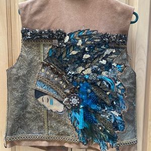Indian head dress suede vest. One of a kind.